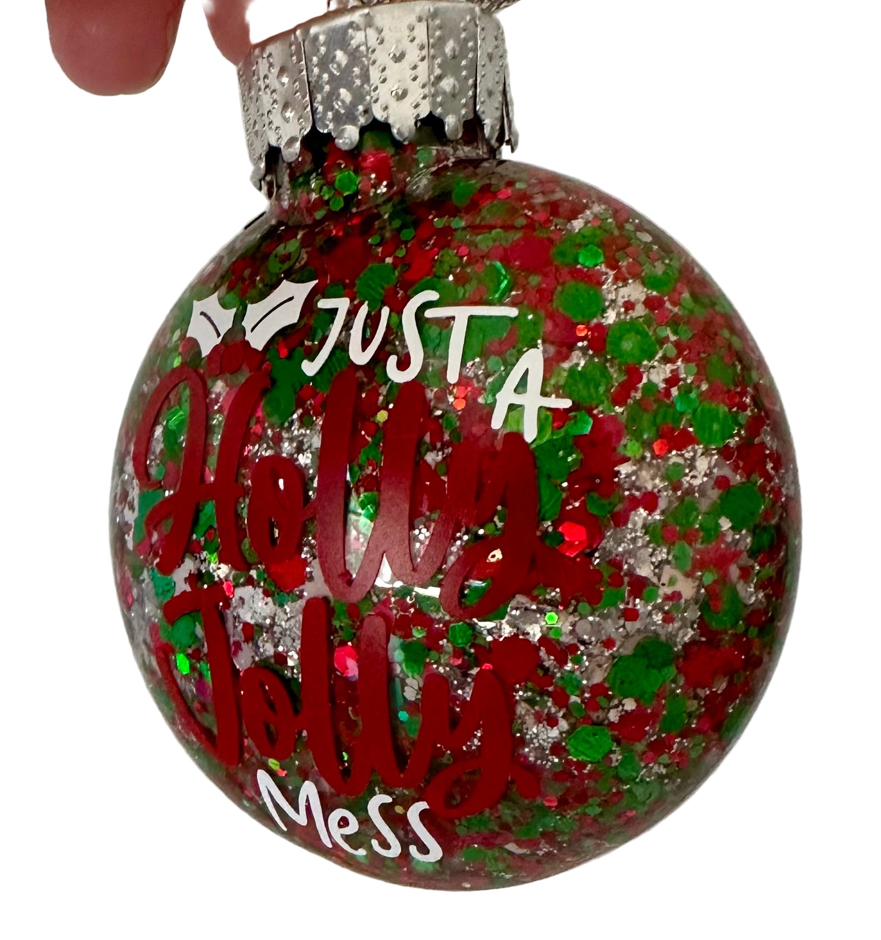 Glitter holiday ornament with fun Holly Jolly Mess text
