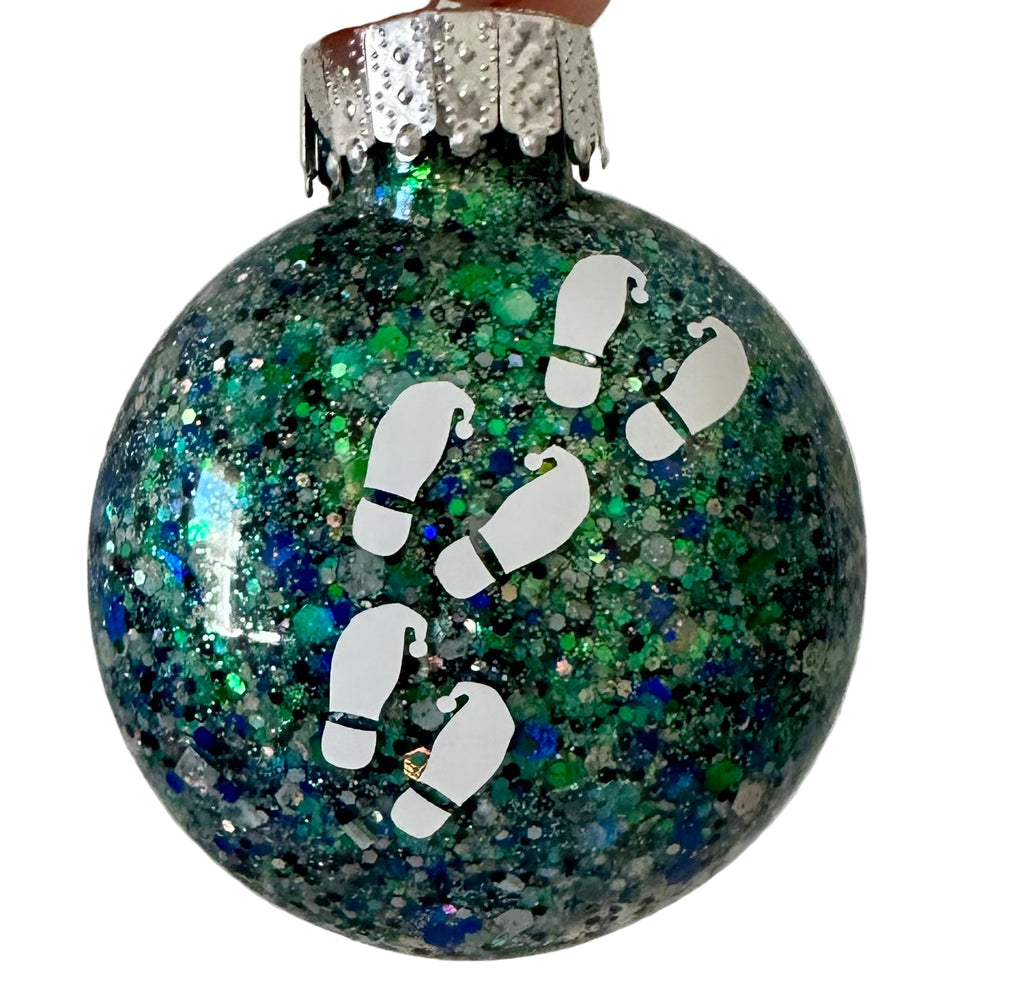 What the Elf Christmas ornament with glitter and elf footprints