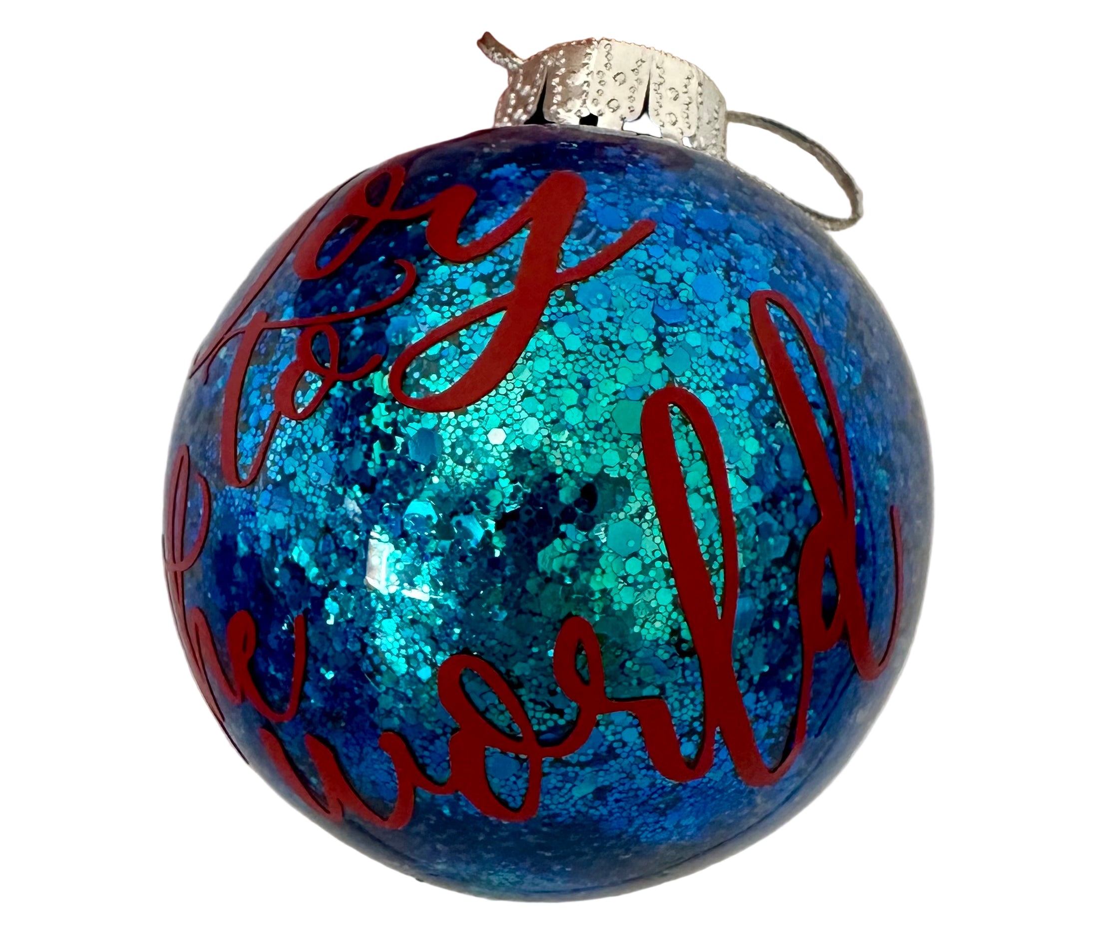 Christmas round ornament with Joy to the World phrase and sparkle