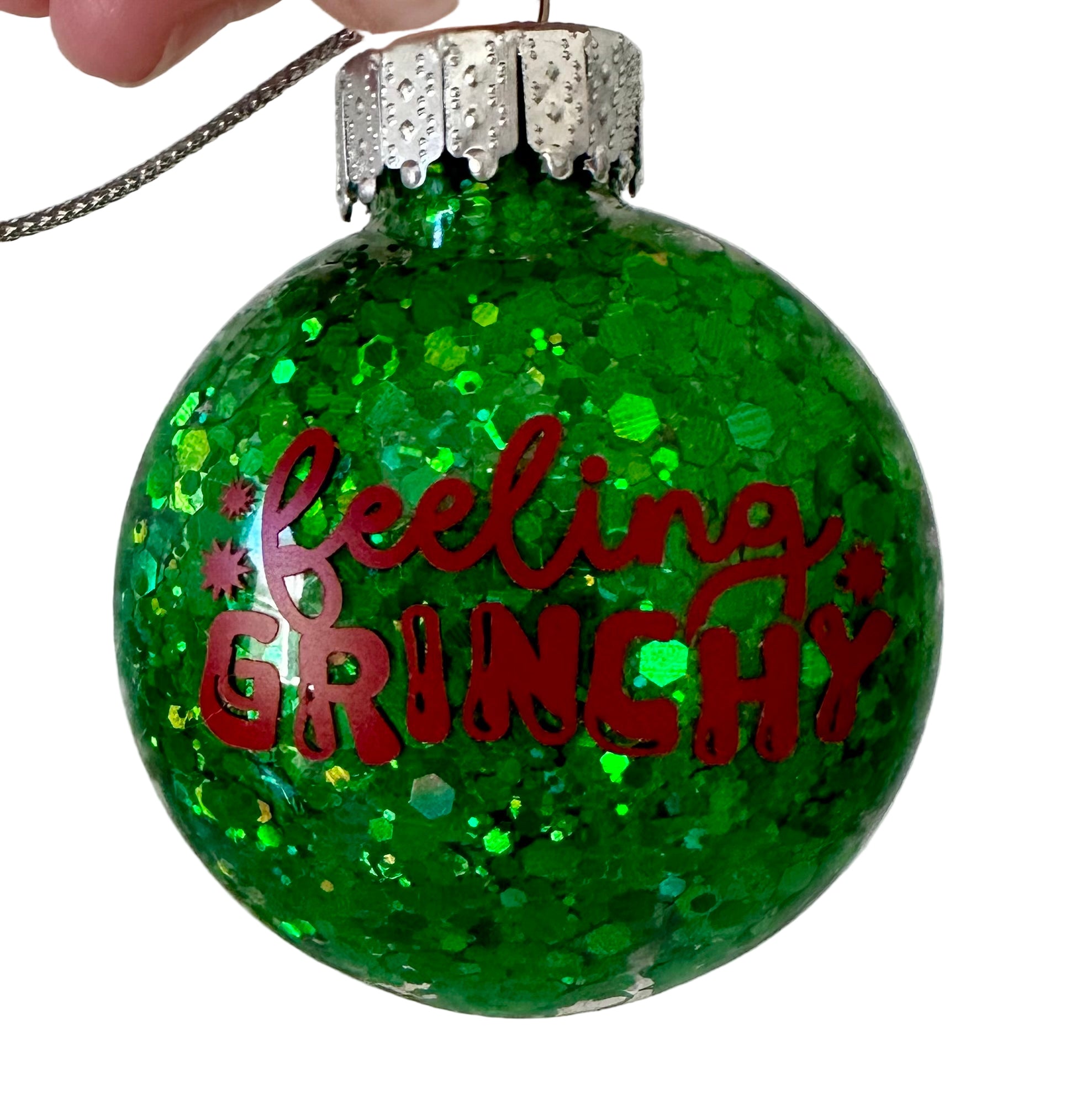 Feeling Grinchy Christmas ornament with green glitter finish